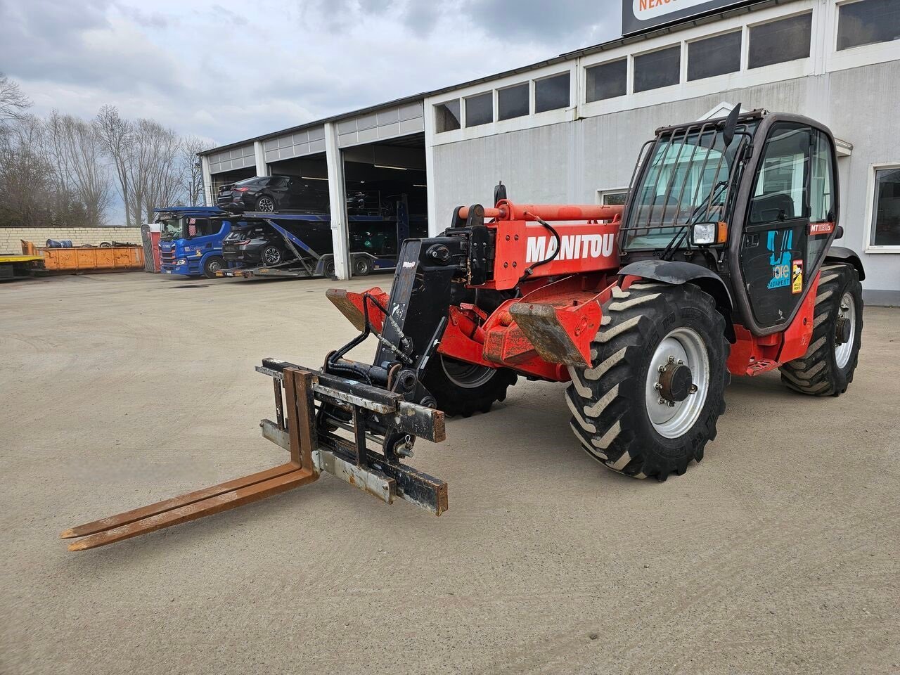 0-22.jpg Chariot télescopique Manitou MT1030 – Image 1