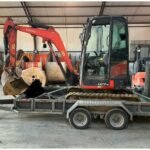 Kubota U27-4 avec remorque et accessoire